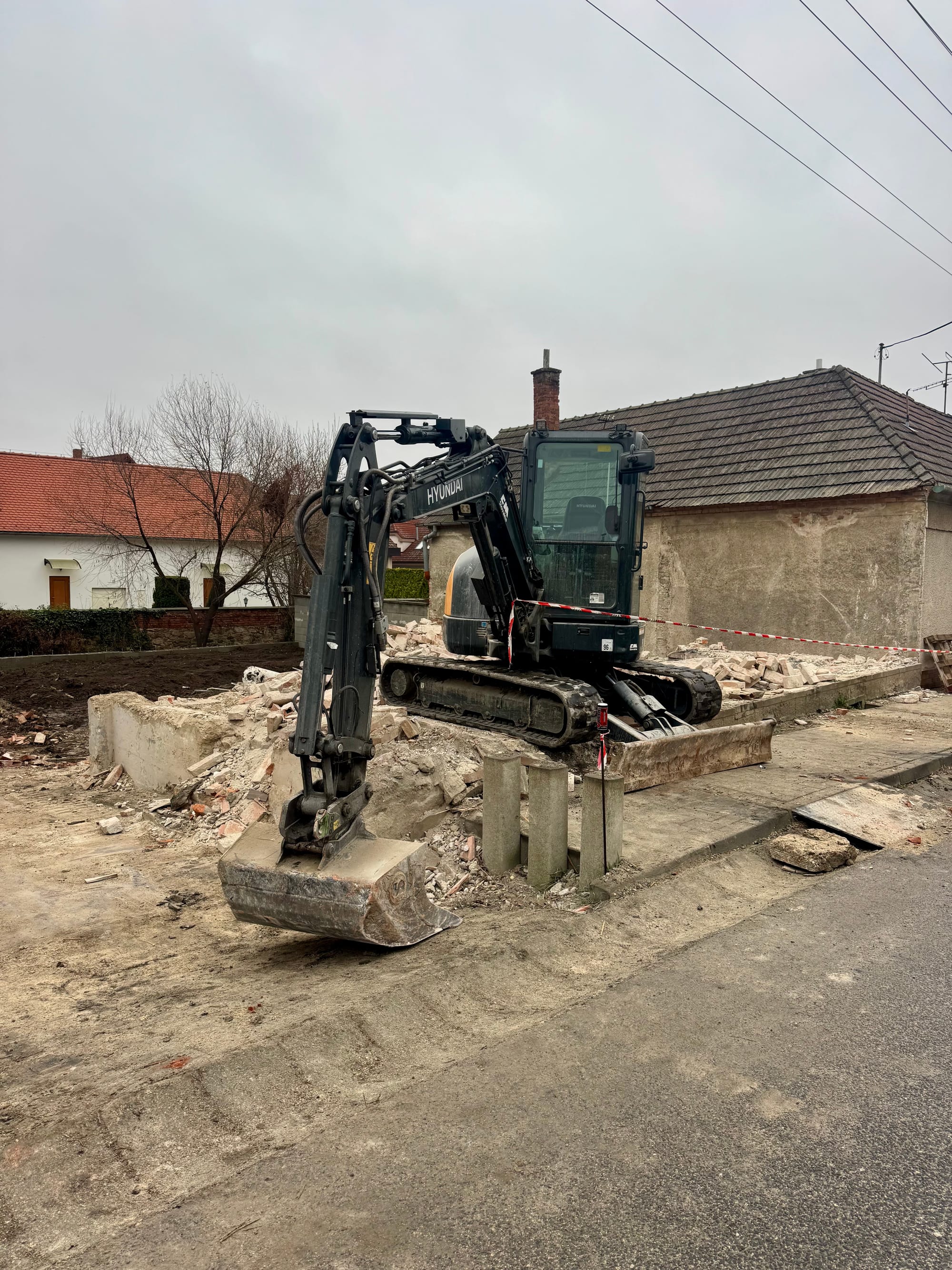 Bager St. Marco pri búraní objektu